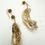 Pikkukuva: Assymetrical Oyster Catgold Earrings