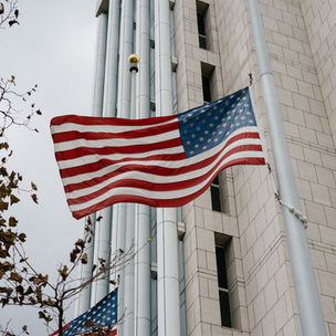United States flag in front of building