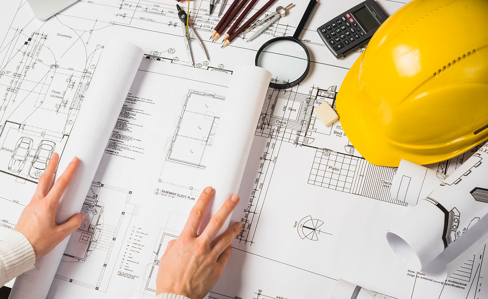 crop-architect-opening-blueprint_edited.jpg