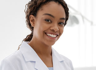 smiling-female-dentist (2)_edited.jpg