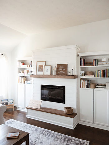 Example of a built-in electric fireplace with all the bells and whistles. (Image linked to source to give credit where it's due.)
