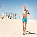 Girl Running on Beach