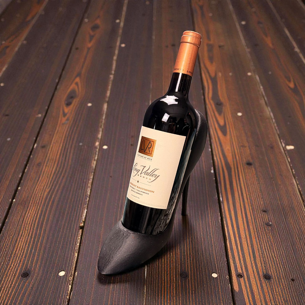 Thumbnail: High heel wine bottle display standing 9 inches tall with bottle for scale