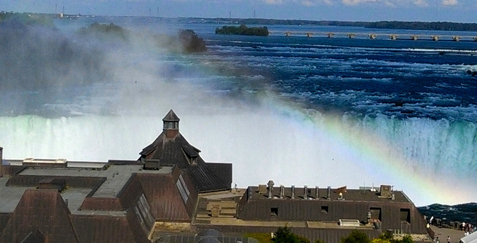 Waterfalls view with a rainbow