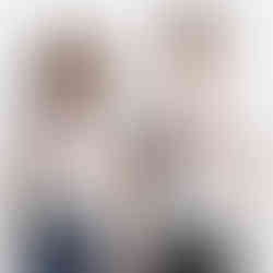 Man and women wearing white short sleeve t-shirts with red maple leaf with 1967 and words July 1 and the word Canada outside the maple leaf