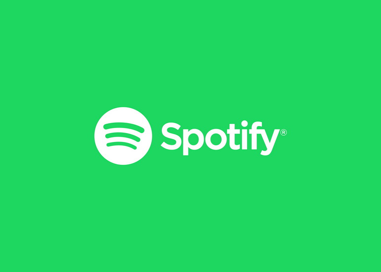 Spotify logo, representing a successful implementation of a freemium business model.