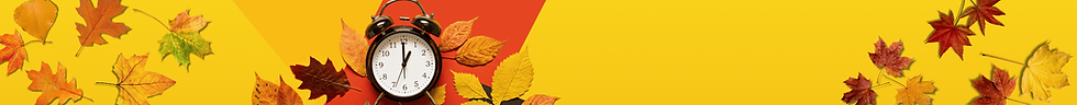 A clock amid autumn leaves, representing the end of Daylight Saving Time