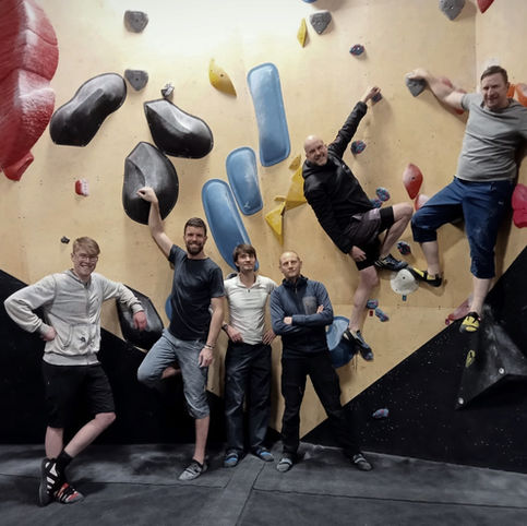 Indoor climbing WASC members hanging around.