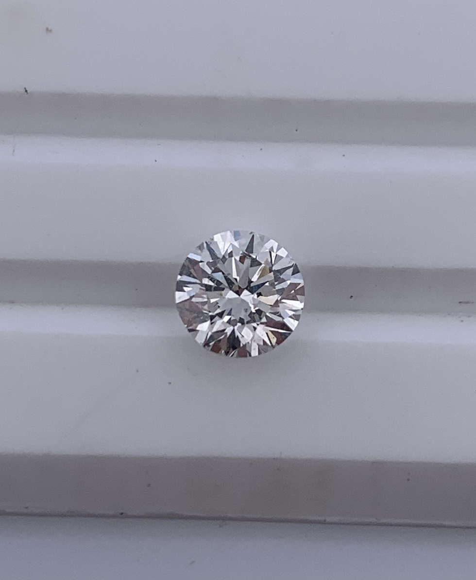 Thumbnail: Gia certified 0.87ct H SI2 natural diamond 