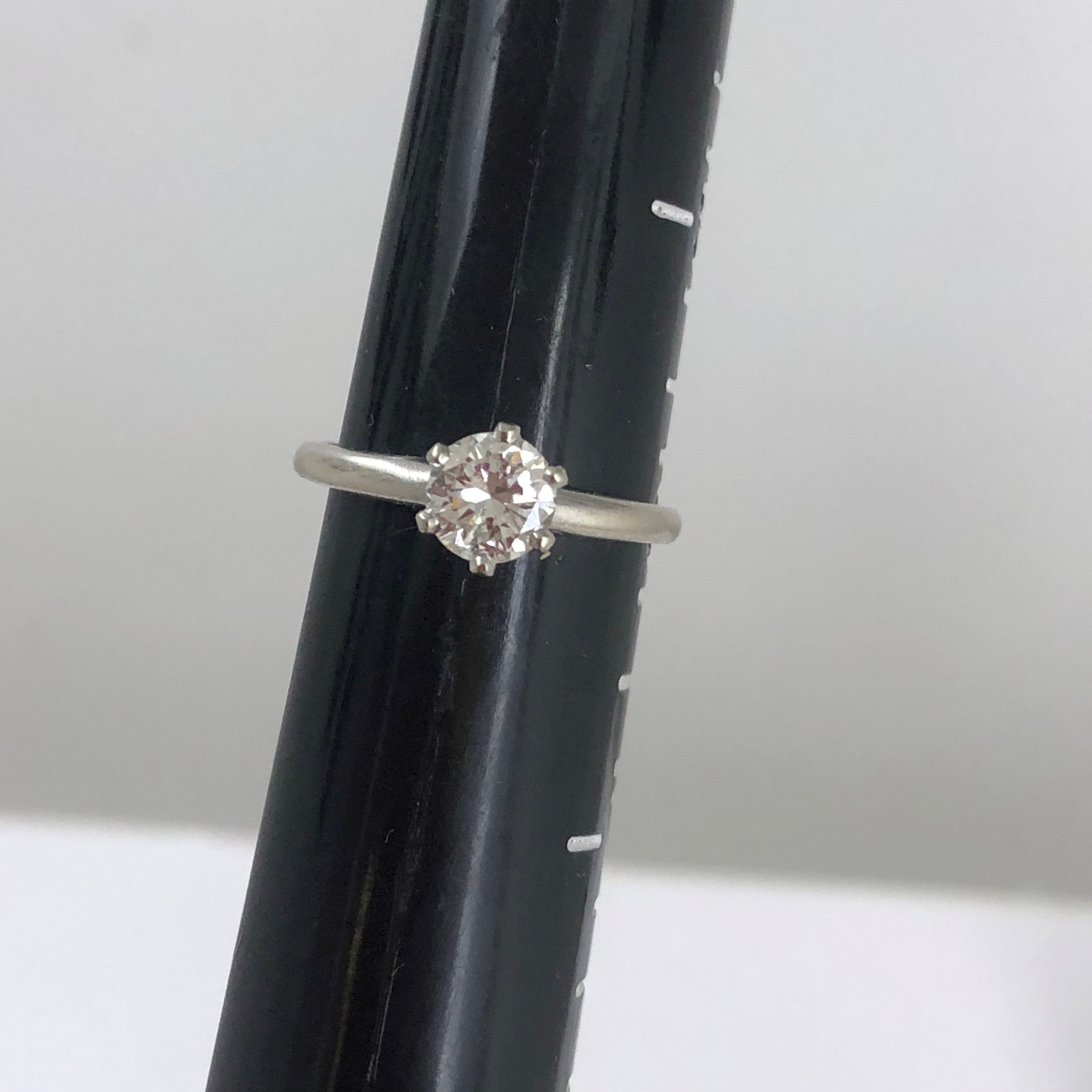 14k white gold Solitaire diamond ring, size 6