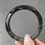 Thumbnail: 56.3MM Type A Black Mix Jadeite Bangle