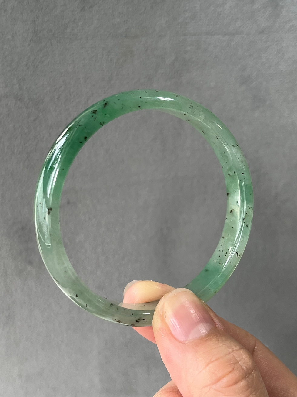 Thumbnail: 54.8MM Type A Translucent Bright Green Mix Black Jadeite Bangle