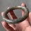 Thumbnail: 55.8MM Type A Greyish Black Mix Jadeite Bangle