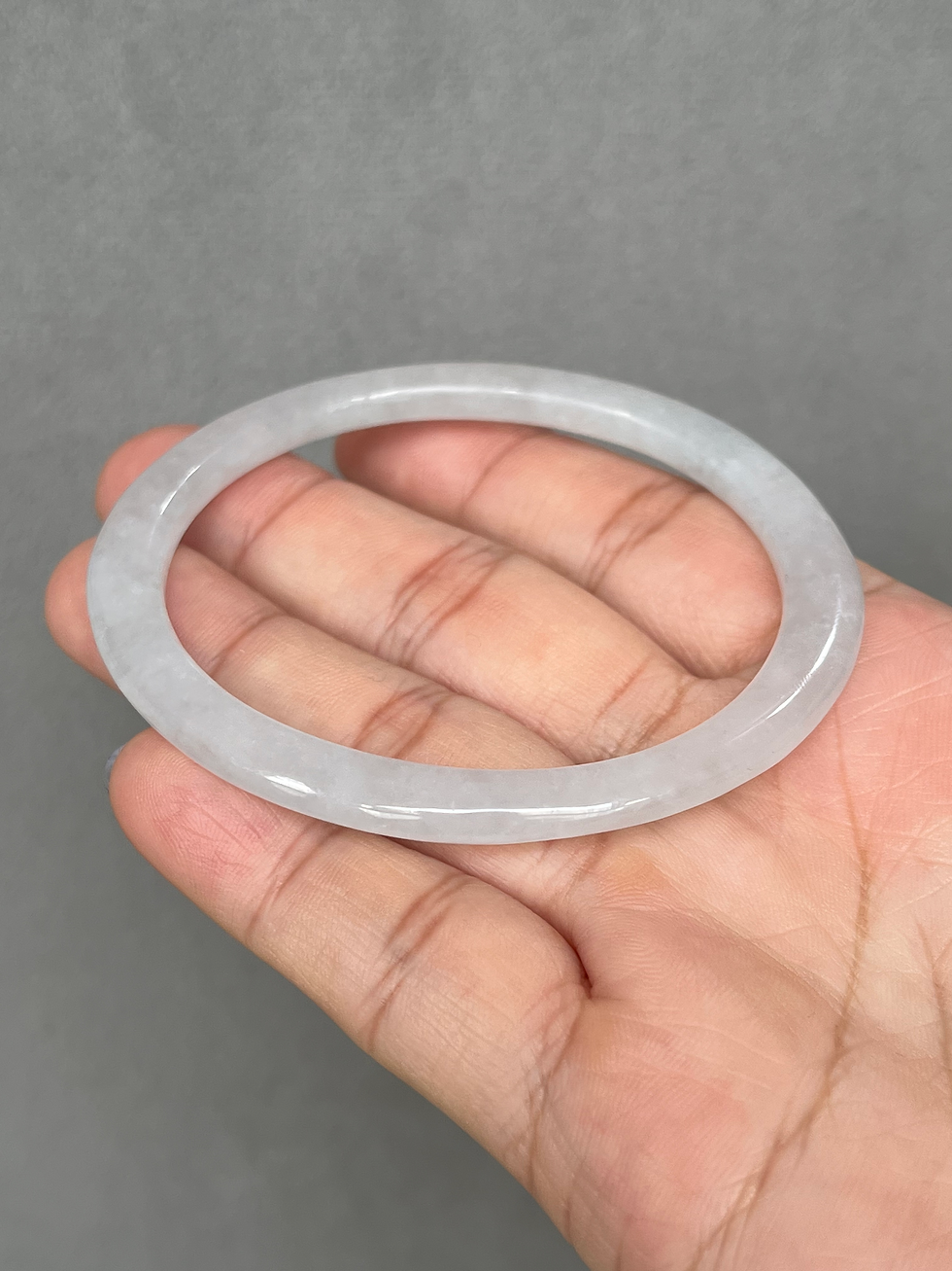 Thumbnail: ***56.3MM Type A Translucent Thin Oval Jadeite Bangle