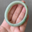 Thumbnail: ***58.7MM Type A Light Green Mix Jadeite Oval Bangle
