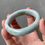 Thumbnail: 56.8MM Type A Faint Green Mix Jadeite Bangle