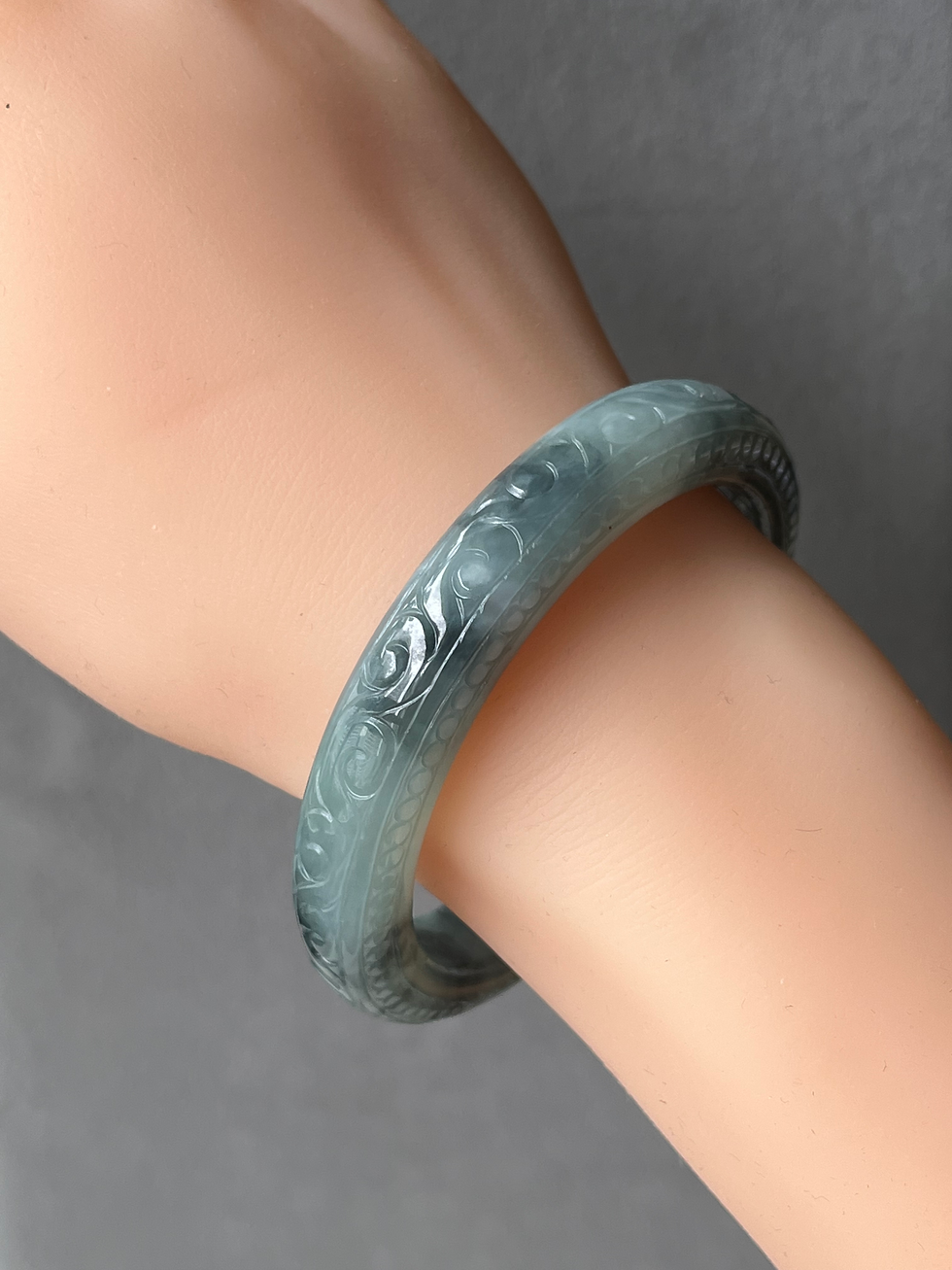 Thumbnail: 55.9MM Type A Dark Bluish Green Mix Carved Jadeite Bangle