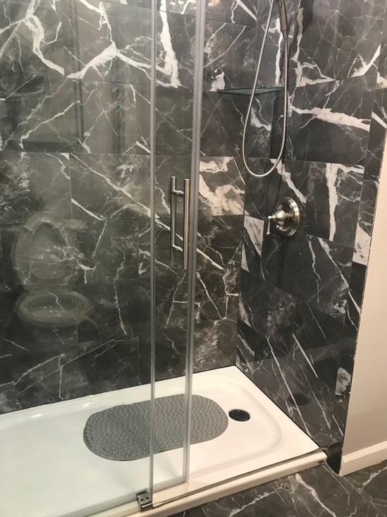 Shaping house beautiful bathroom remodeling. New tiles, bath tub, shower. 