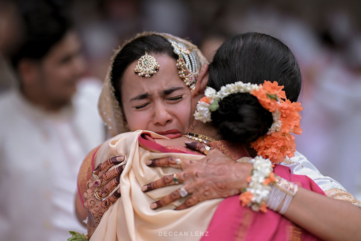 Bride’s mother blessing her before the wedding rituals