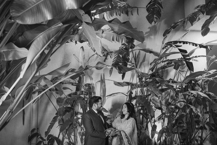 Groom adjusting his sherwani before the baraat procession