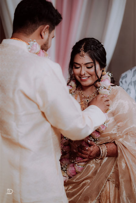 Close-up of colorful flower garland with roses and marigolds