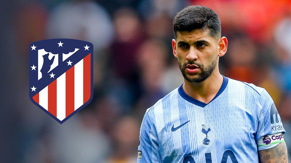 Soccer player in a light blue Tottenham jersey appears focused. Atletico Madrid logo on left. Blurred crowd background.