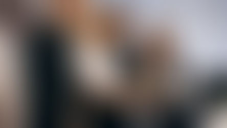 Am image of business students looking at a report.