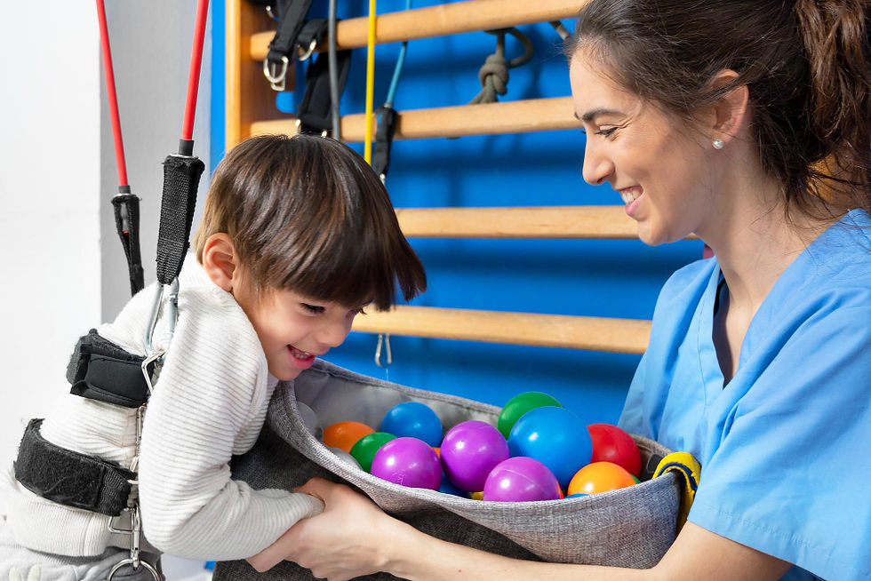 An occupational therapist helping a child through play.