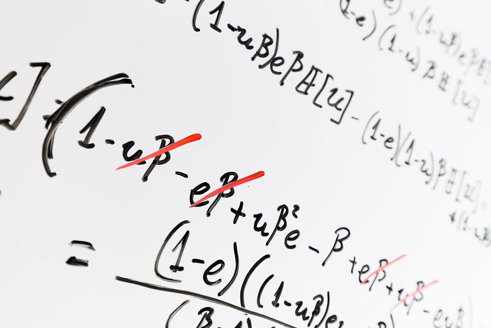 Whiteboard with maths formulae.