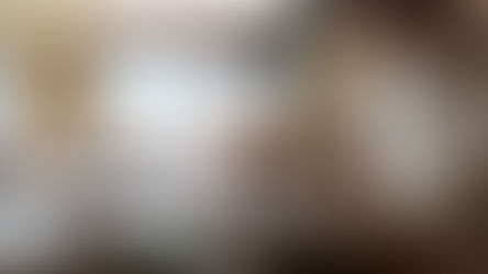 A podcaster speaking through a microphone as part of a Media course.