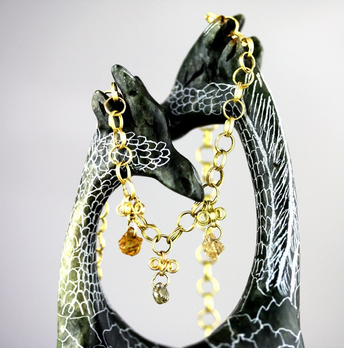 Gold spiral necklace with rough diamonds
