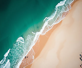 photo from the sky of the beach that looks like it was shot from a drone.jpg