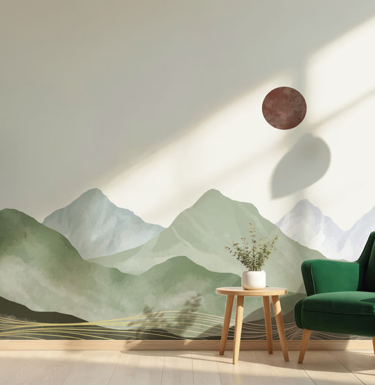 A modern lobby featuring a green armchair, small table, potted plant, and Covr’s Echo Peaks - Highland Wash custom wallpaper adds a striking touch with its abstract mountain and sun design.