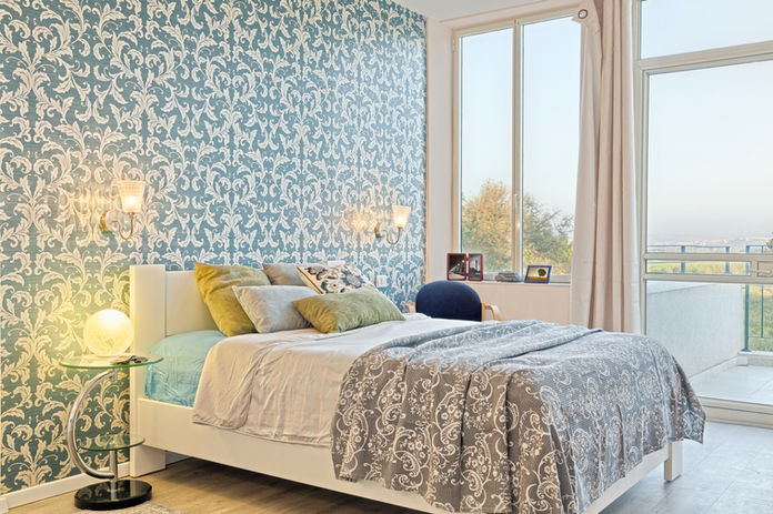 Custom-printed wallpaper with a blue and white pattern