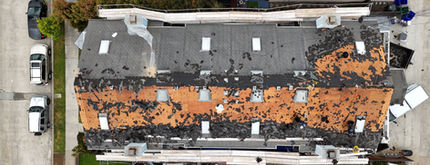 Pacific Beach apartment roof deck exposed during tear-off