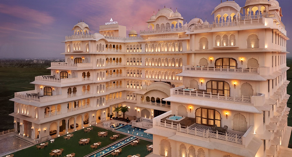 Majestic and elegant, Anantara Jewel Bagh stands illuminated against the twilight sky.