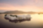 The majestic Taj Lake Palace in Udaipur floats serenely on the shimmering waters of Lake Pichola.