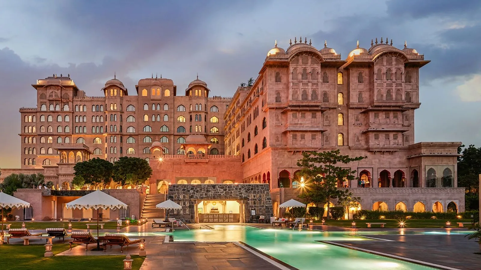 The Fairmont Jaipur stands majestically against the evening sky.