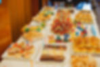 Catering table with different buns and sweets