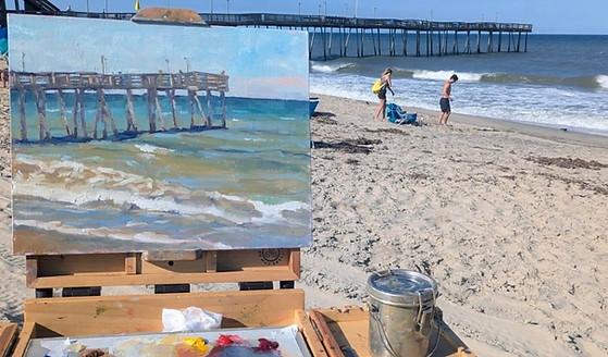 Honorable Mention award recipient Elizabeth Blanchard's plein air set up at Avalon Pier. P
