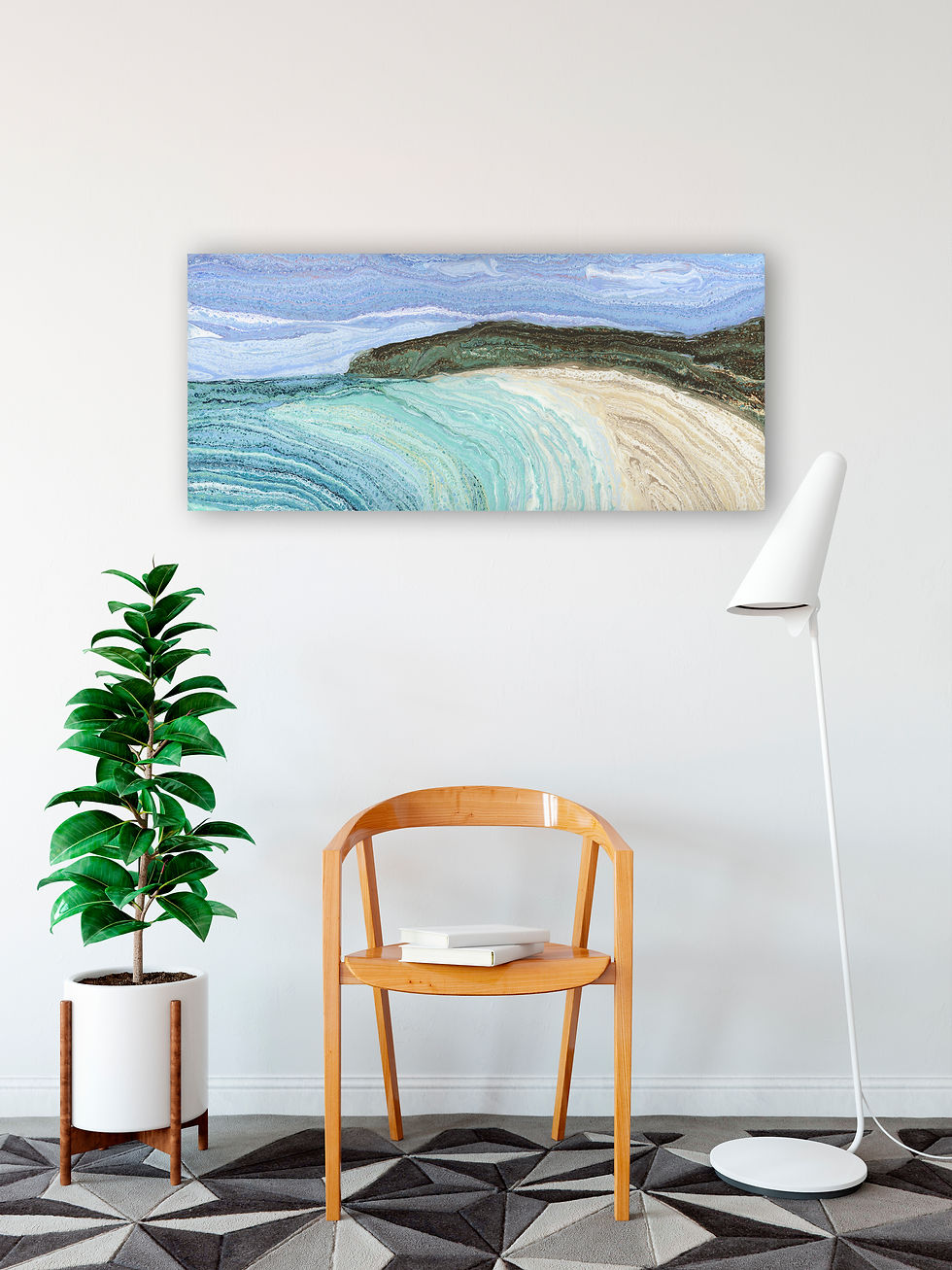 beautiful artwork mounted on a wall above pot plant chair and lamp