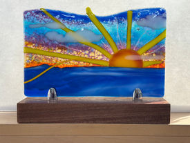 Fused glass sun panel with. mahogany stand