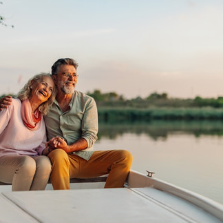 Mature couple happy on a boat