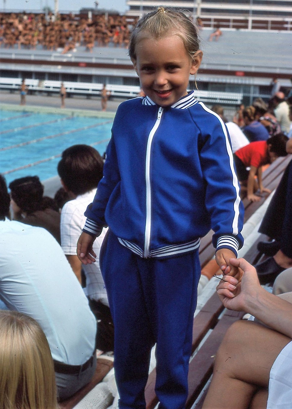 Sally after her swimming race in her blue tracksuit