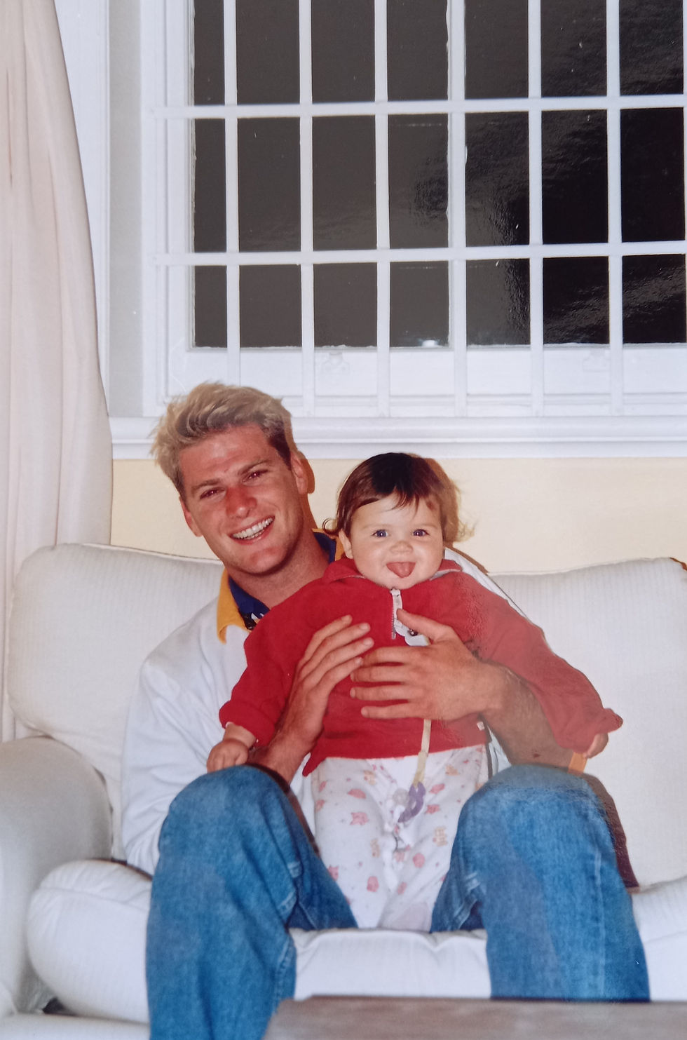 Greg holding Katja in Anton & Carine's flat in Greenpoint