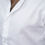 Thumbnail: White linen shirt styled with blue jeans on a model outdoors