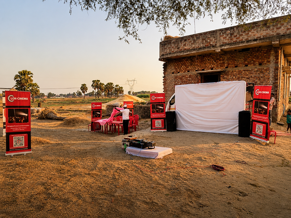 THE SCREEN ARRIVES Transforming an open community space into a temporary cinema venue.