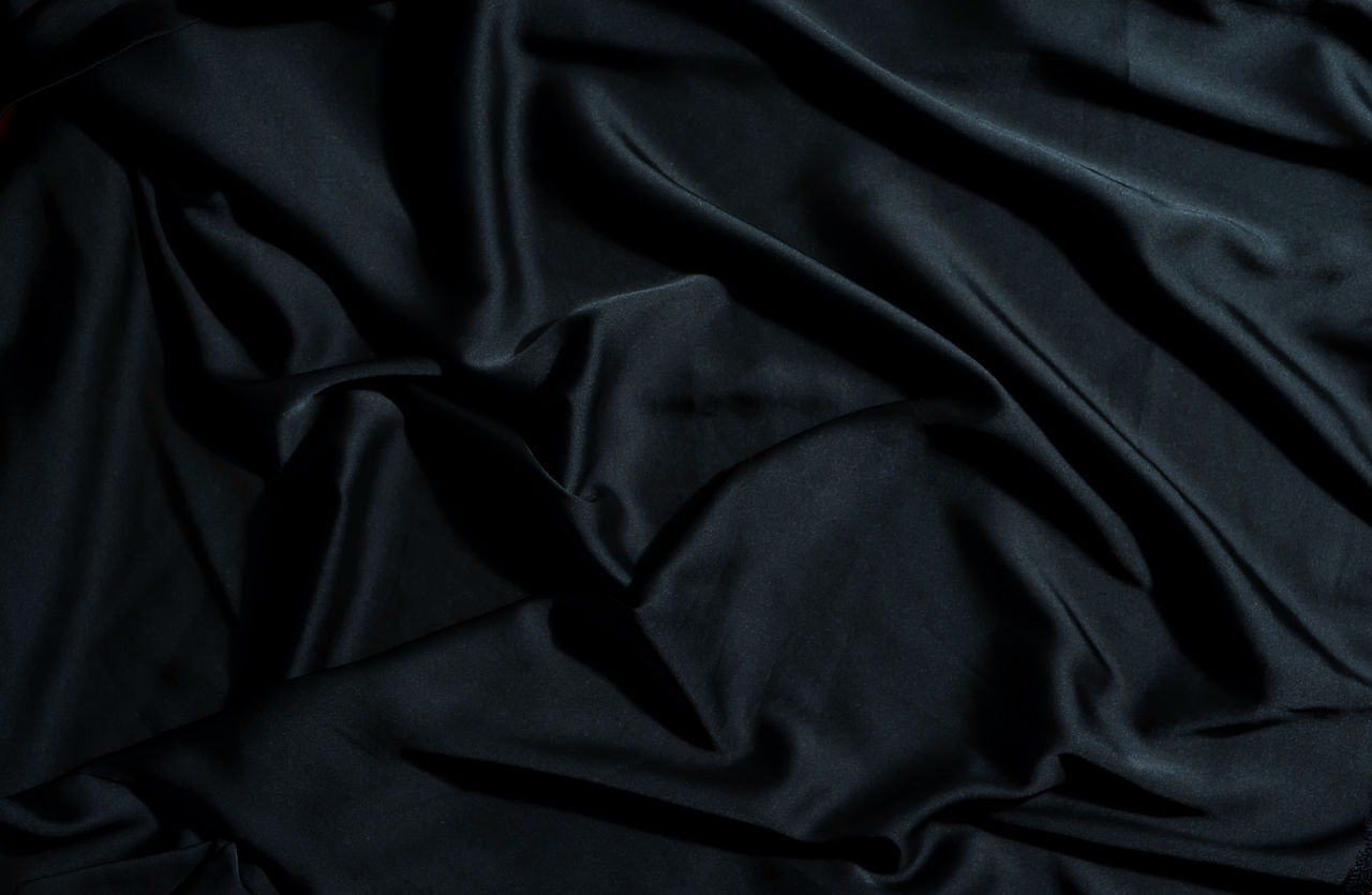 crumpled-textile-fabric-background-of-bl