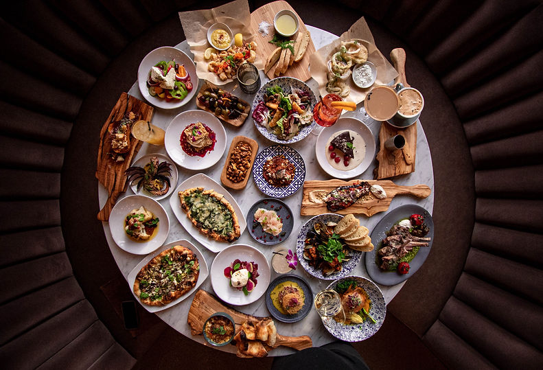 Trade Boston Table of Greek Dishes