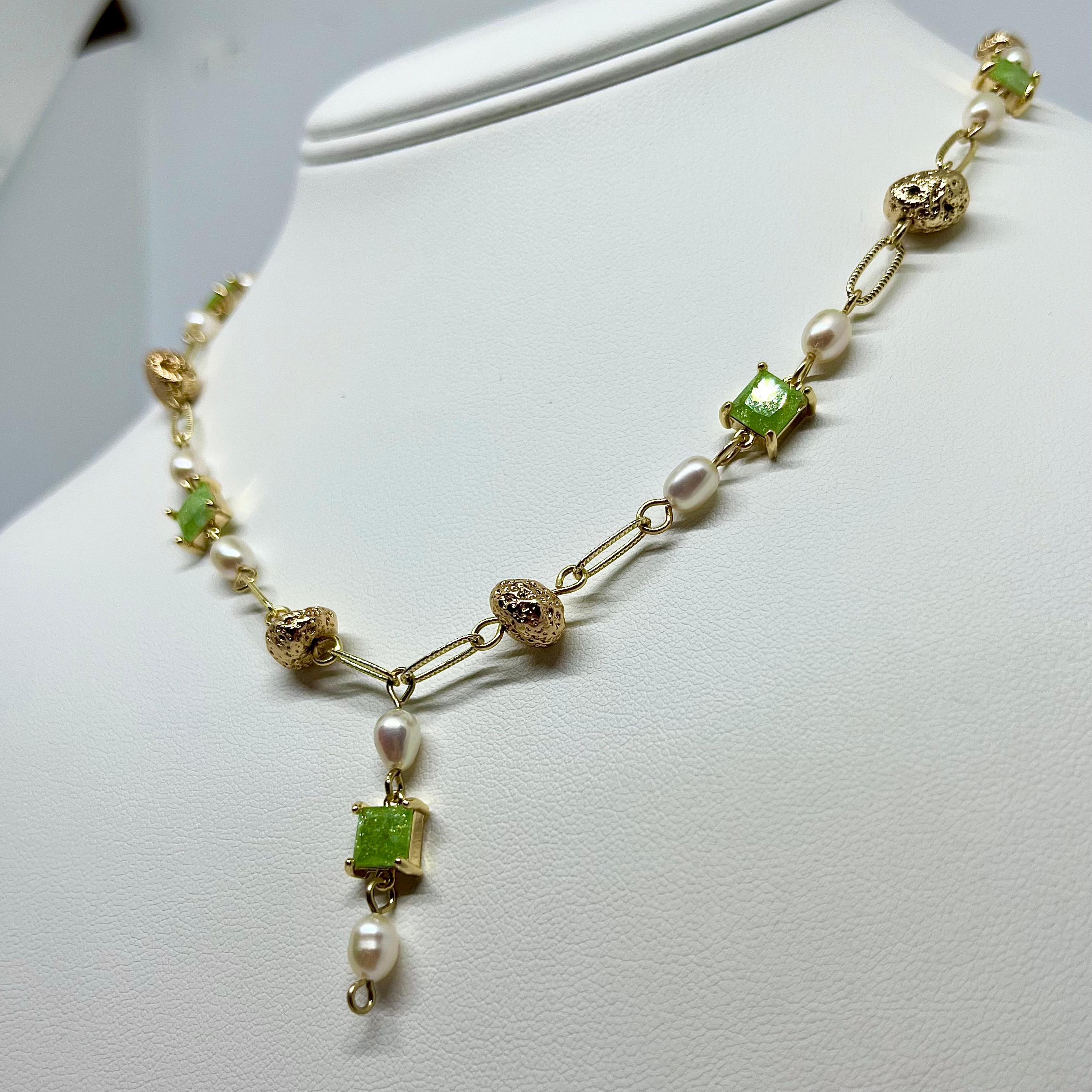 Green with pearl and gold necklace